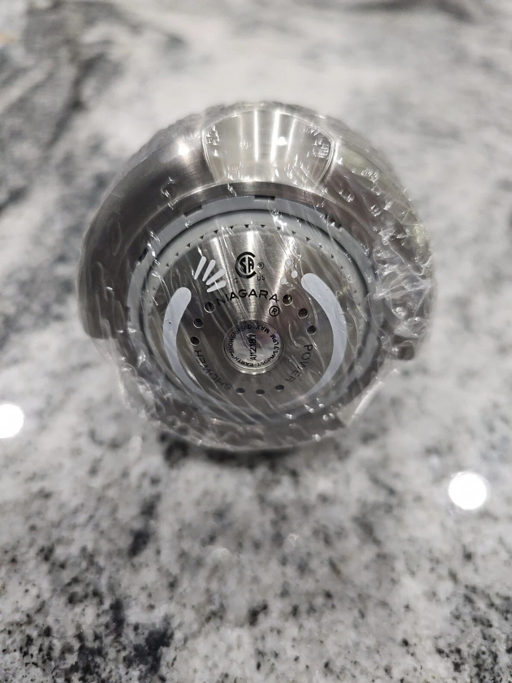 This is a Niagara Conservation N2915BN Earth Spa 3-Spray Showerhead with a brush